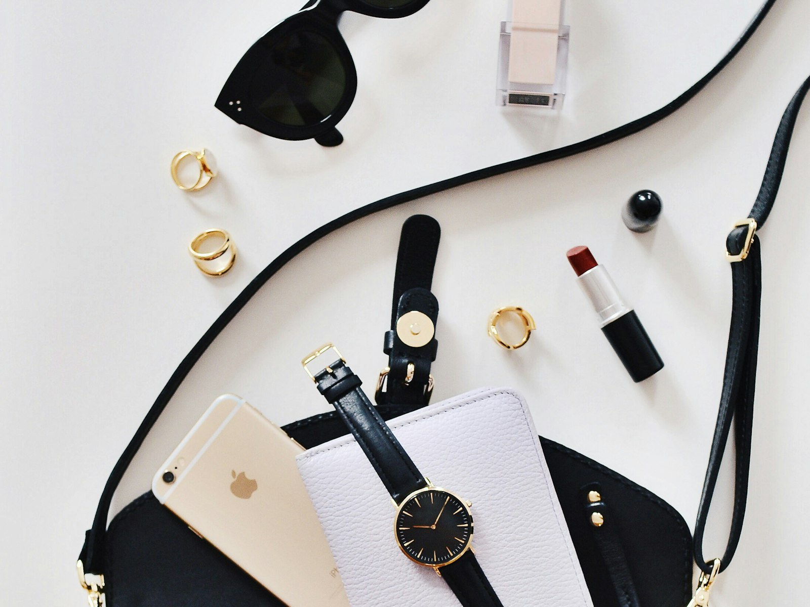 Curated vintage accessories arranged on a linen surface