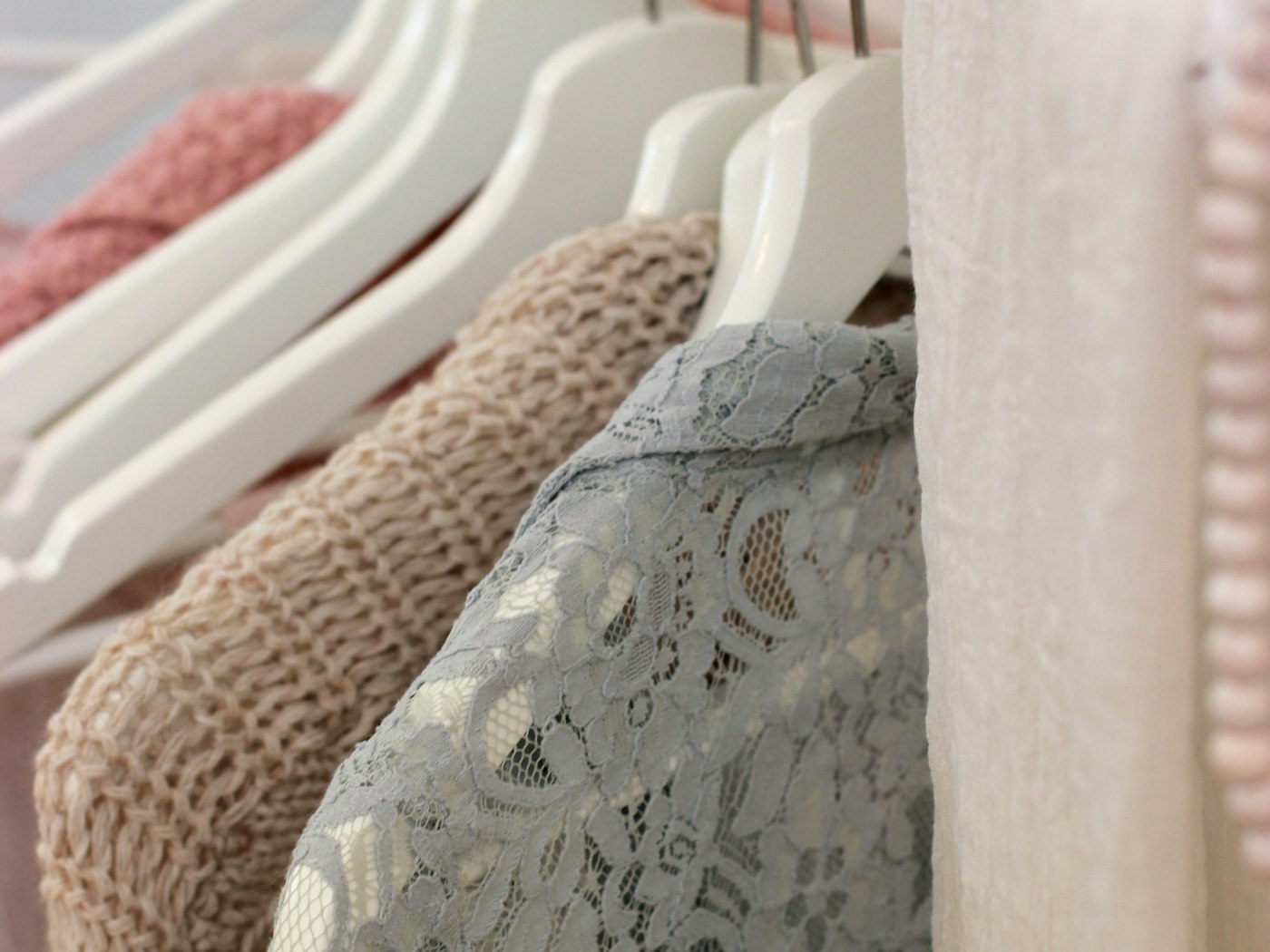 Garments hanging in the Maison Archive workroom
