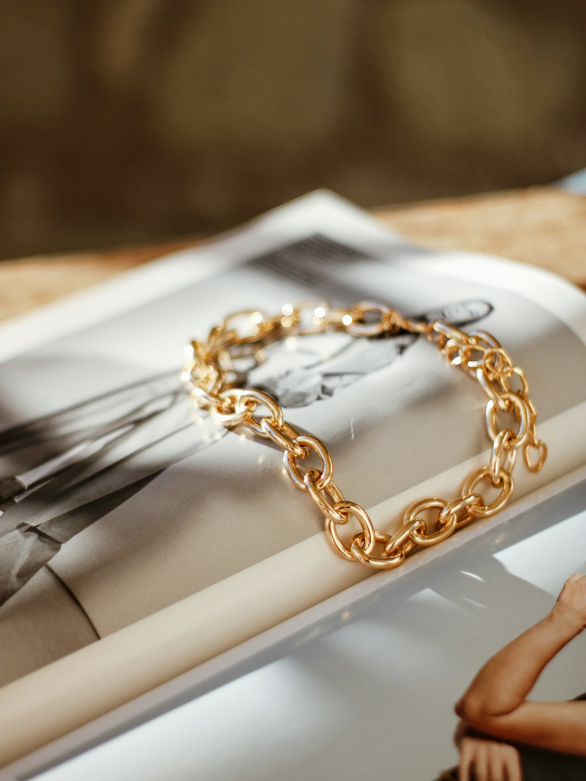 Antique gold jewellery arranged on ivory silk